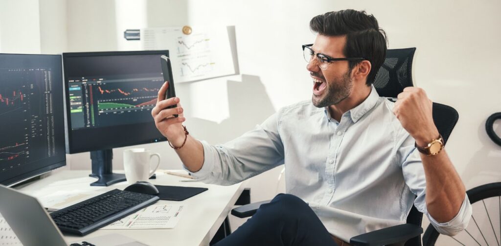 man getting excited when in his office chair