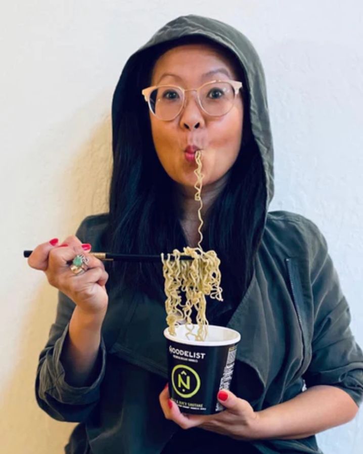 woman eating noodles